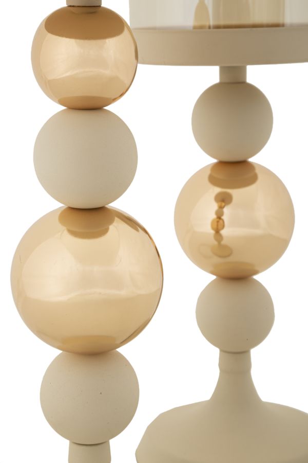 Dettaglio ravvicinato dello stelo GLASSY crema con sfere alternate in ceramica opaca e vetro lucido #colore_Crema