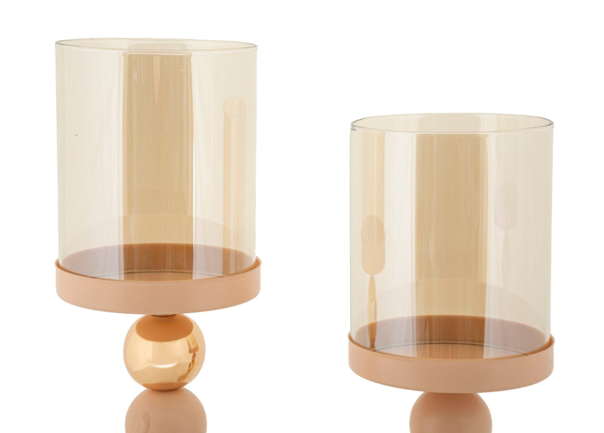 Dettaglio dal basso dei portacandele GLASSY rosa con cilindri fumé e sfere caramello #colore_Rosa