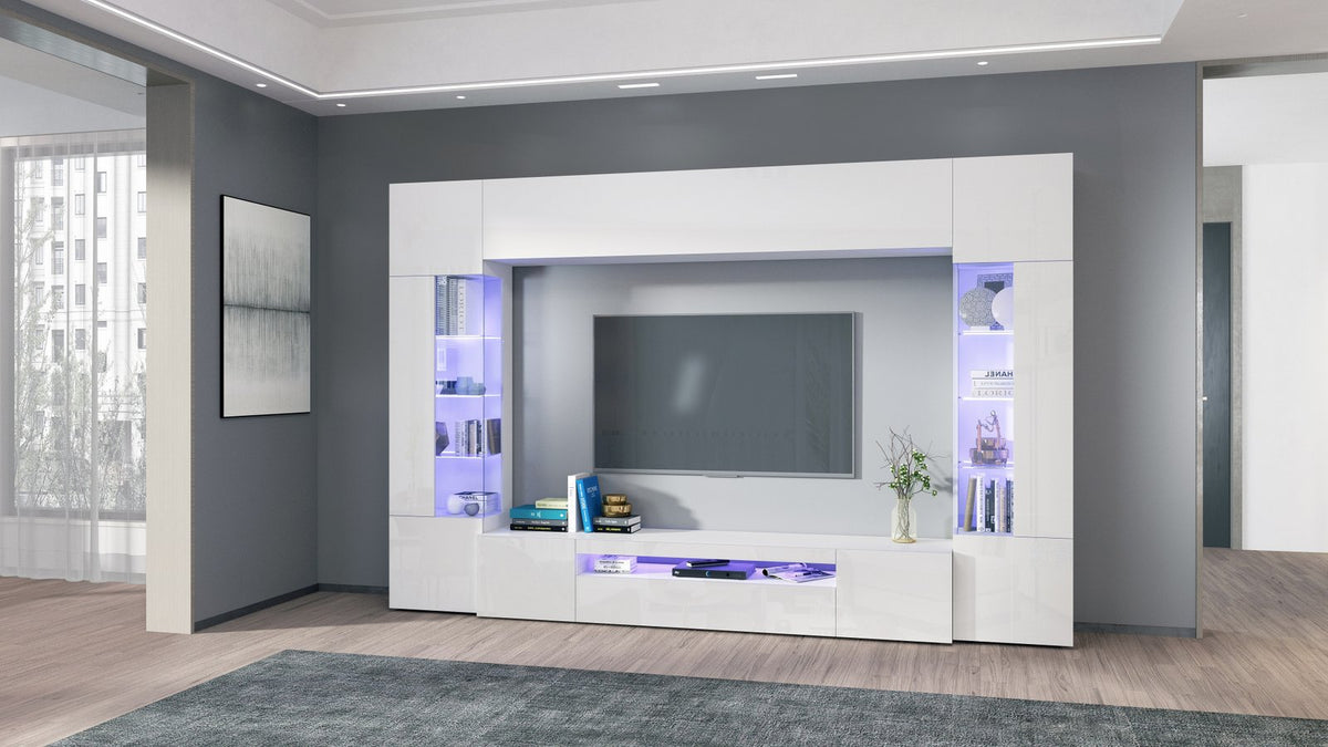 Parete attrezzata QUANTUM bianco lucido vista frontale con vetrine laterali e consolle illuminata #colore_Bianco Lucido