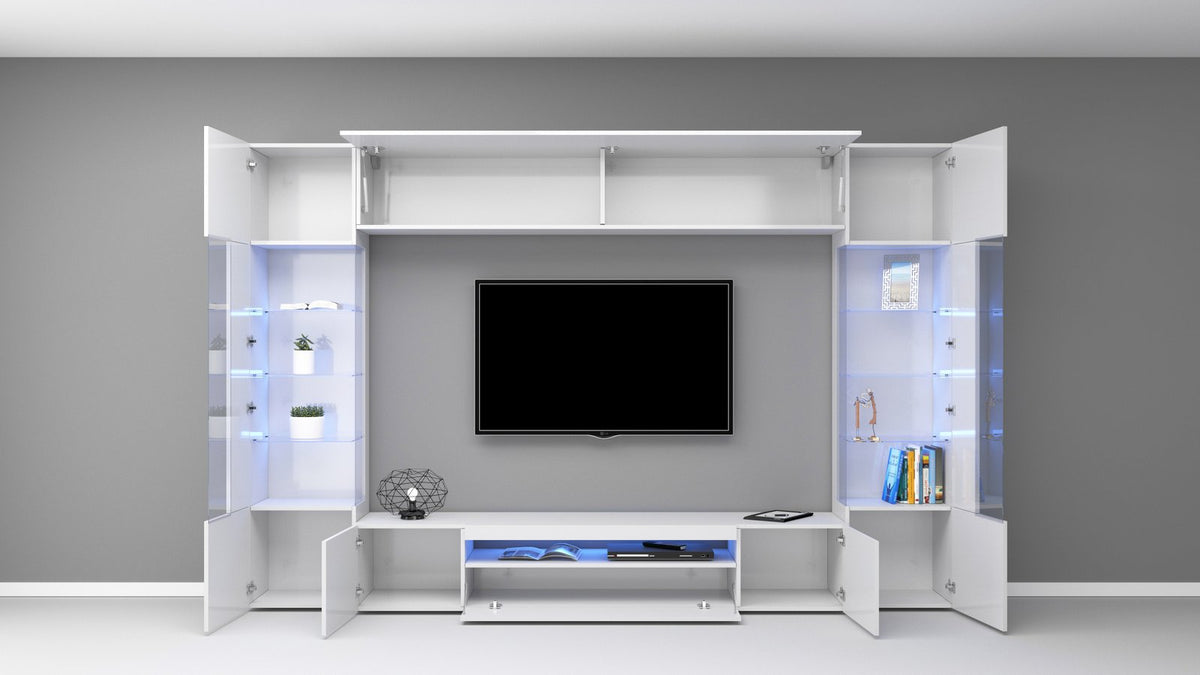 Parete attrezzata QUANTUM bianco frontale con ante aperte e vani illuminati in blu #colore_Bianco Lucido