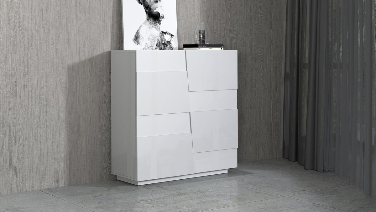 Credenza INFINITY bianco lucido appoggiata a parete grigia con stampa e libro sul piano #colore_Bianco Lucido