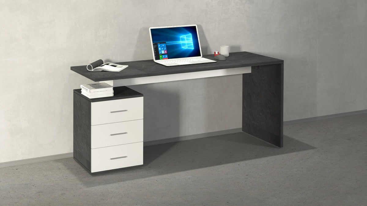 Scrivania NOVA antracite opaco con piano effetto cemento e cassettiera bianca in ambiente interno #colore_Bianco Lucido/Antracite Opaco