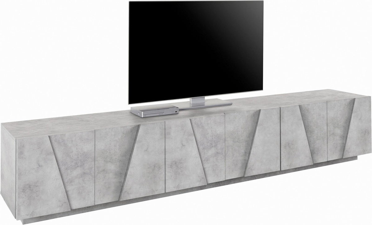 Porta TV PULSE cemento visto di lato, fronte con tagli diagonali a zig-zag #colore_Cemento