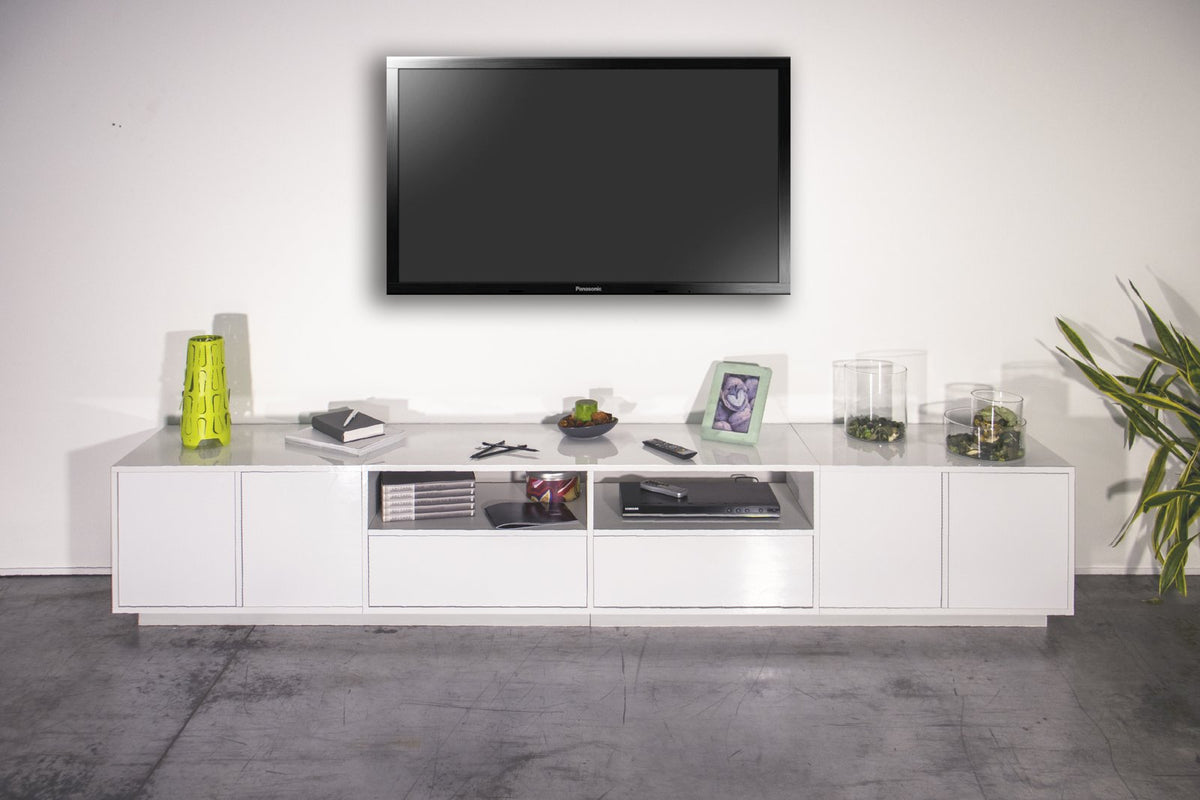 Porta TV ENIGMA bianco lucido frontale con quattro ante lisce e due cassetti centrali