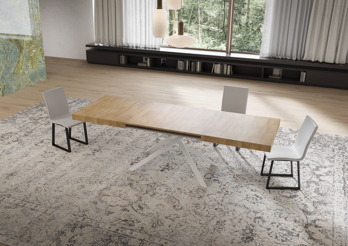 Tavolo NIKET noce allungato con piano effetto quercia e gambe bianche tonde rastremate #colore_Noce