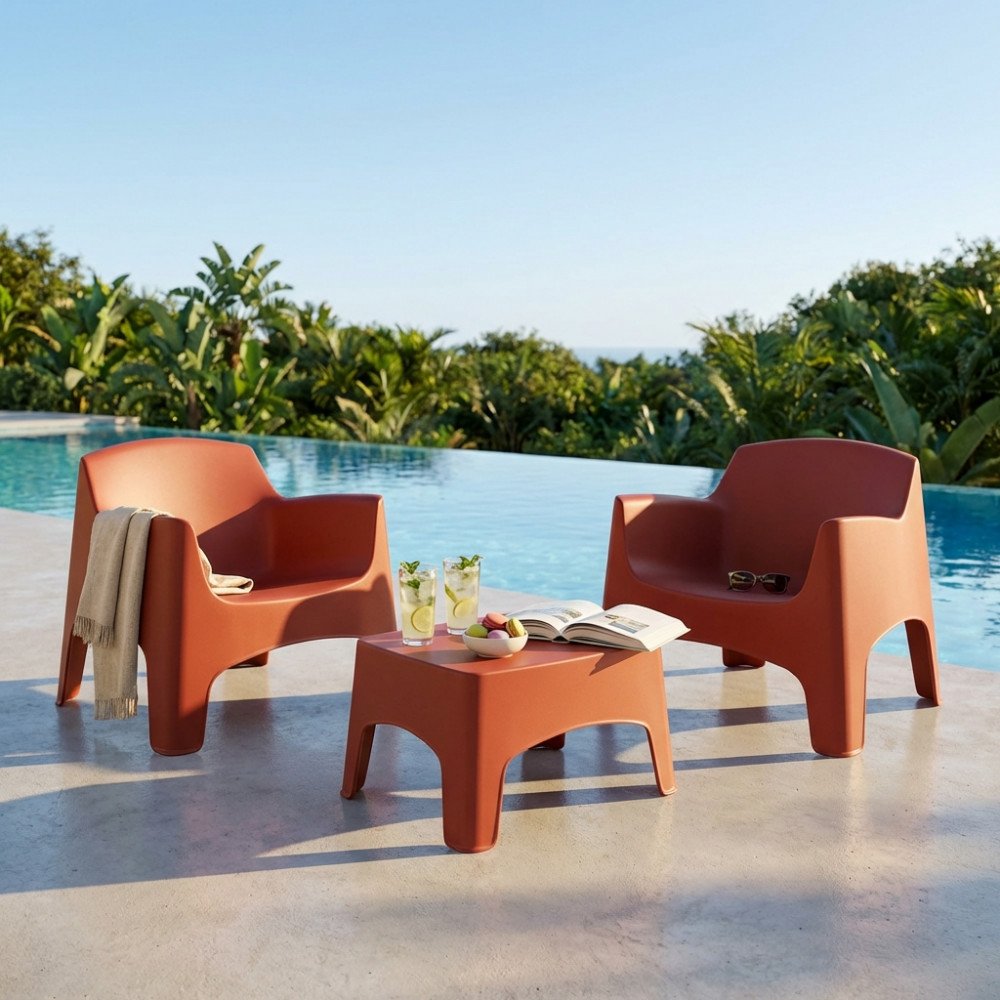Salotto IBIZA TERRACE rosso mattone con due poltrone e tavolino, vista tre quarti in piscina