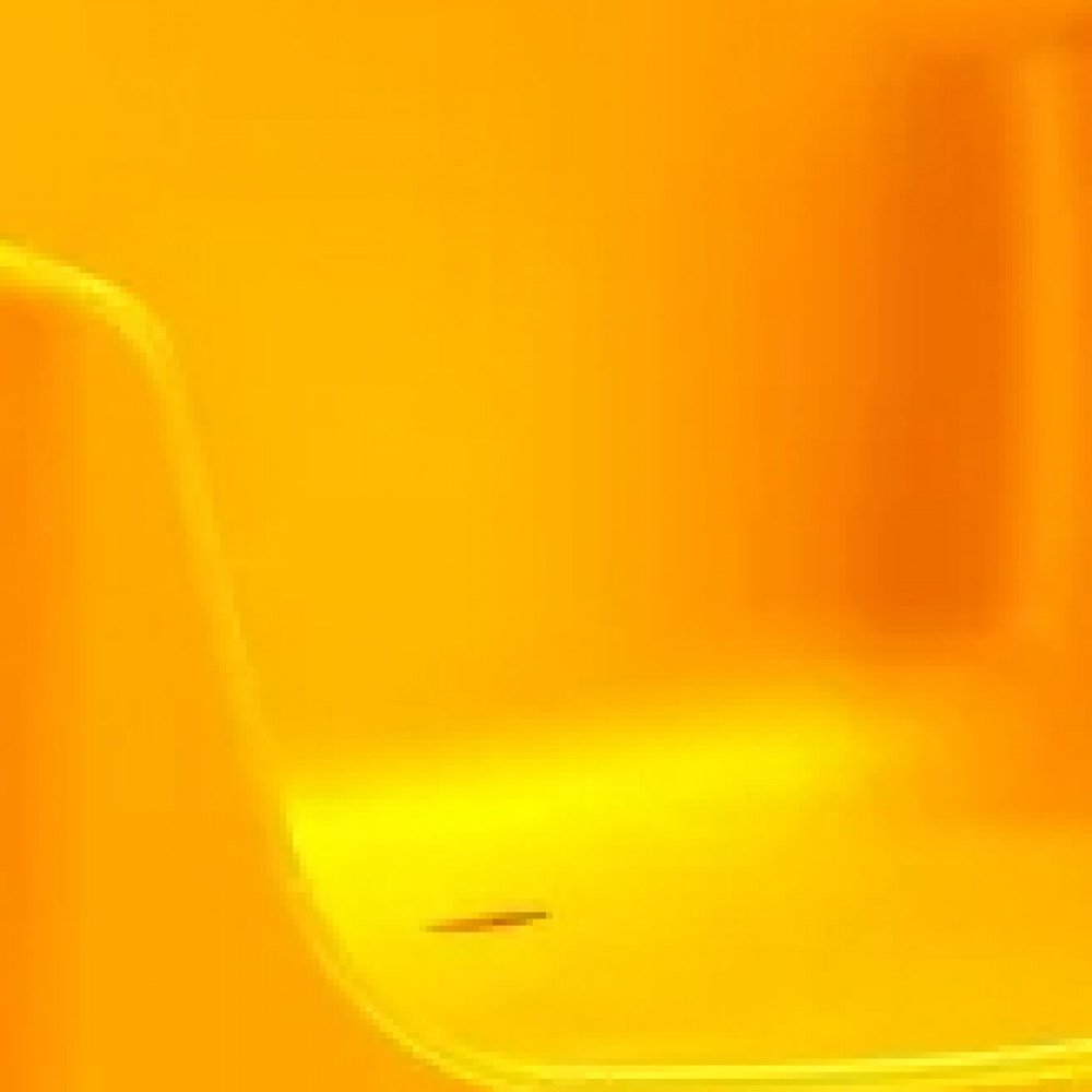 Poltrona monoblocco IBIZA giallo fotografata da vicino, immagine sfocata che non mostra dettagli