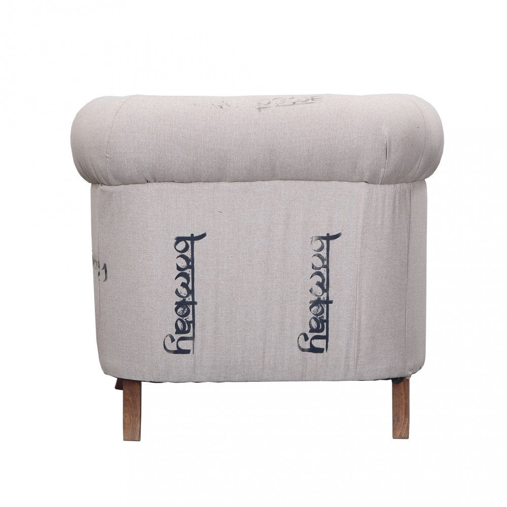 Poltrona MERCER beige vista dal retro con scritta bePure stampata sul tessuto
