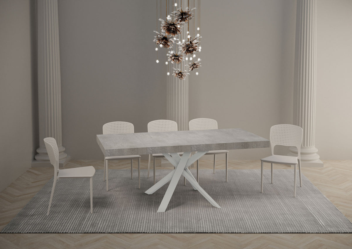 Tavolo allungato CLERK PREMIUM cemento con gambe bianche a X in ambiente #colore_Cemento