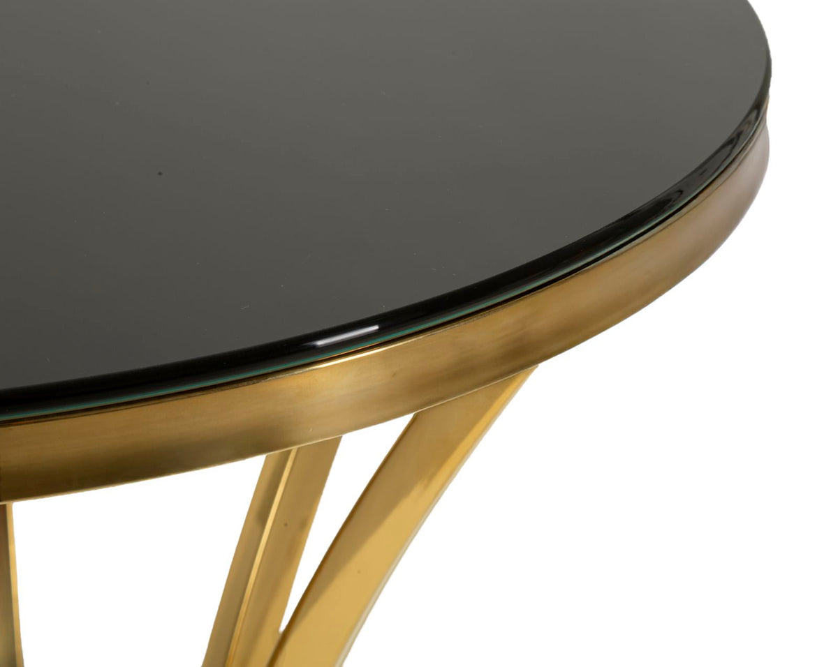 Tavolino SHANTY oro, primo piano del piano scuro e delle gambe dorate #dimensione_Ø50 H92 cm