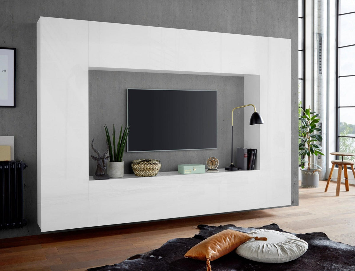 Parete attrezzata ECHO bianco lucido con TV incassata in ambiente industriale, vista frontale #colore_Bianco Lucido