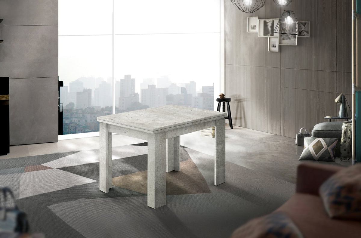 Tavolo LYRA in finitura bianco lucido e cemento nella configurazione base in ambiente arredato #colore_Bianco Lucido/Cemento