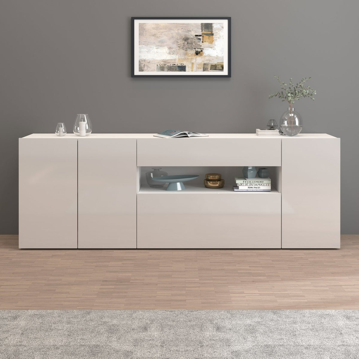 Credenza bianco opaco vista frontale, due cassetti centrali e vano a giorno aperto