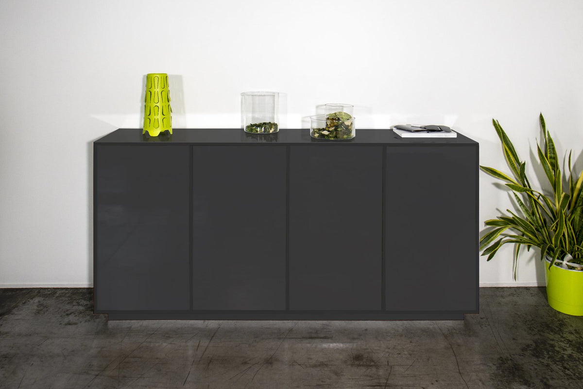 Credenza ENIGMA antracite opaco frontale su parete bianca con vaso verde lime sul piano #colore_Antracite Opaco