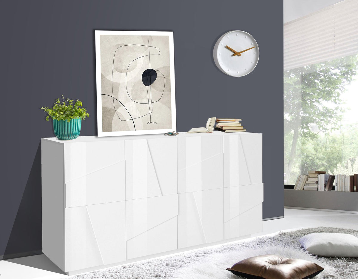 Credenza PULSE bianco lucido in ambiente interno con vaso, quadro e libri appoggiati sul piano #colore_Bianco Lucido