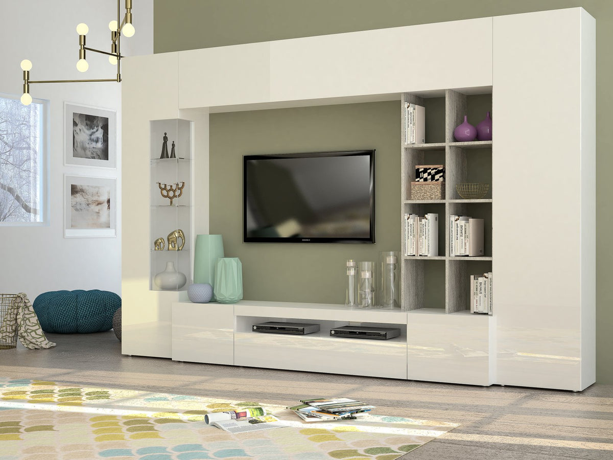 Parete attrezzata STELLAR bianco lucido in soggiorno con libreria a giorno, tappeto a pois e lampadario #colore_Bianco Lucido/Cemento