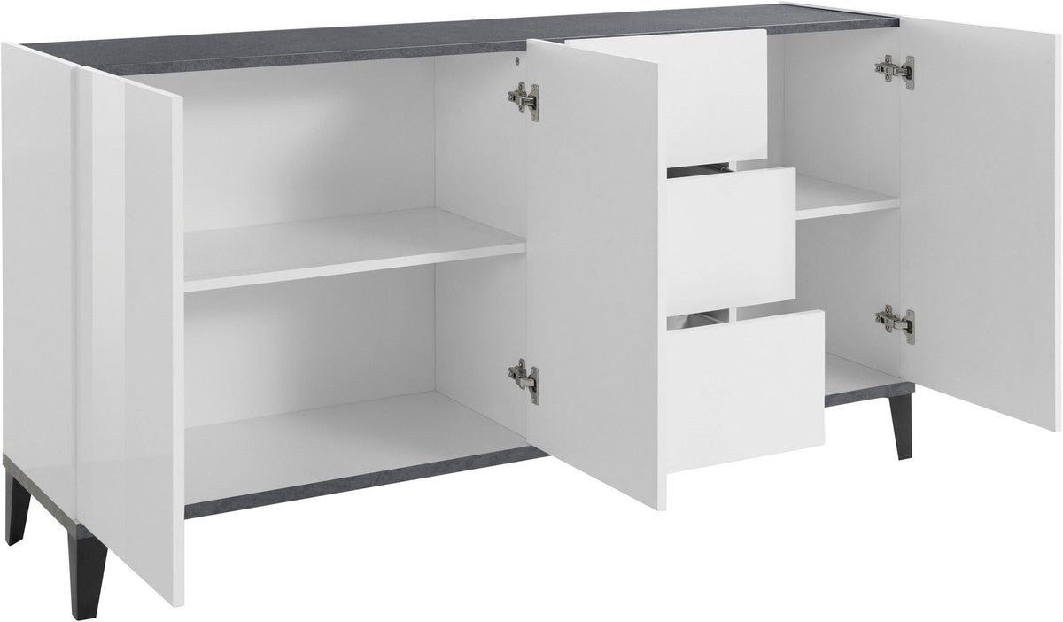 Credenza ARTEMIS bianco opaco con ante aperte, ripiani interni e cassetti visibili, vista di tre quarti