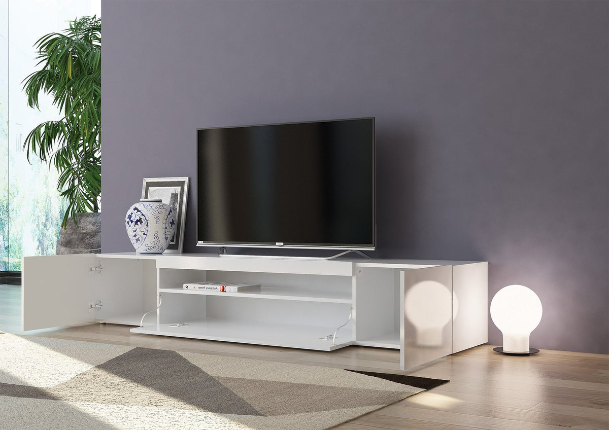 Porta TV FUSION bianco lucido con ante aperte, televisore e libro sul ripiano #colore_Bianco Lucido