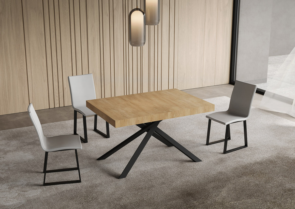 Tavolo NIKET noce chiuso con base a X antracite su tappeto grigio #colore_Noce