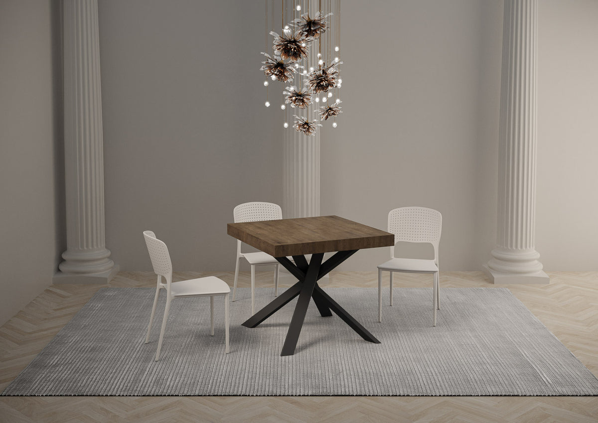 Tavolo quadrato CLERK noce scuro con gambe antracite incrociate in ambiente #colore_Noce