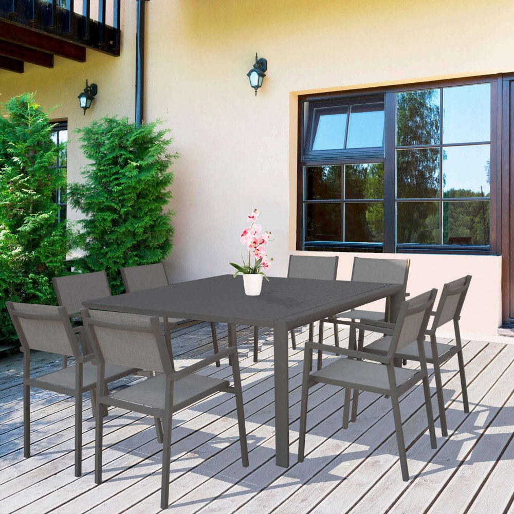 Tavolo BILBAO taupe su terrazzo con otto sedie coordinate, vaso di orchidee e finestra #colore_Taupe