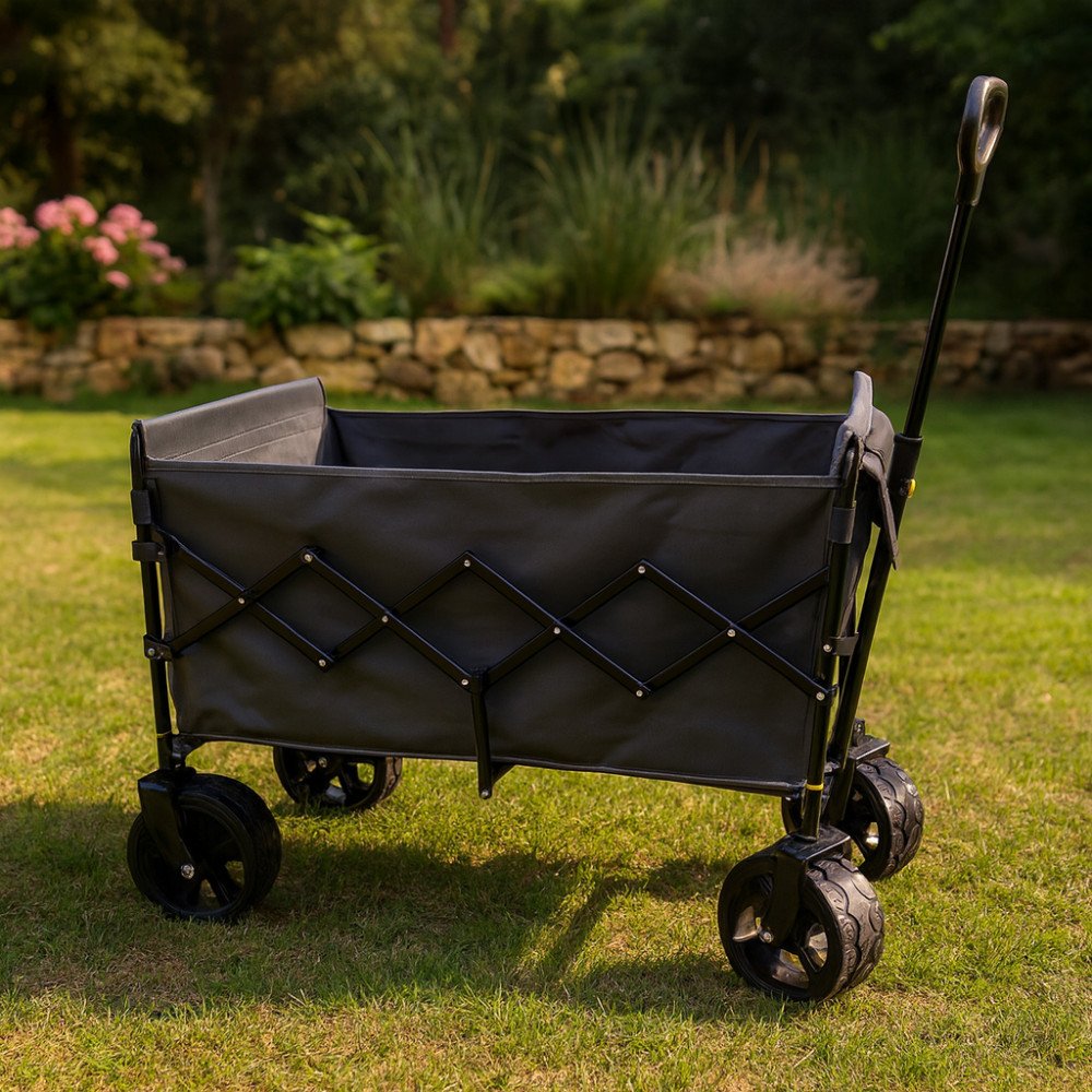 Carrello NORTH grigio scuro montato su prato verde, vista di tre quarti con struttura a X