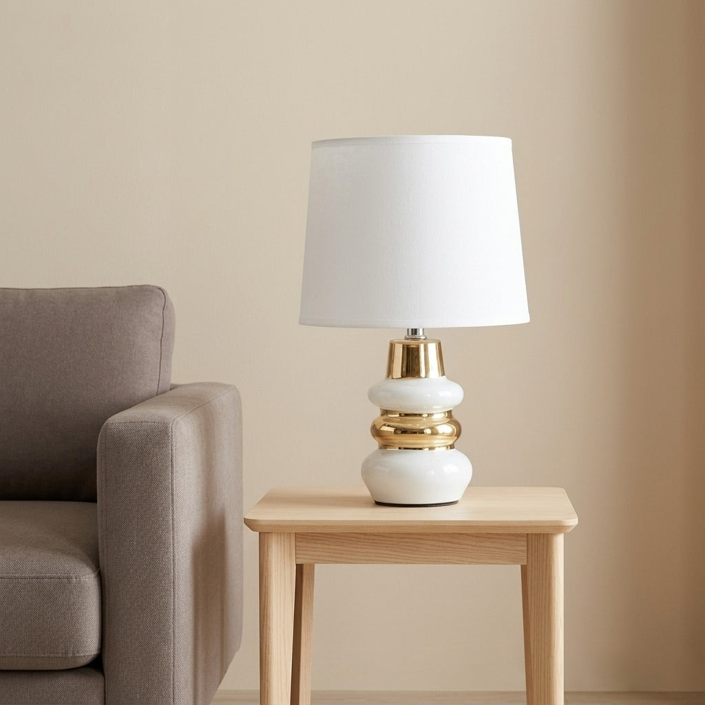 Lampada da tavolo in ceramica bianca e dorata con paralume - LIARA
