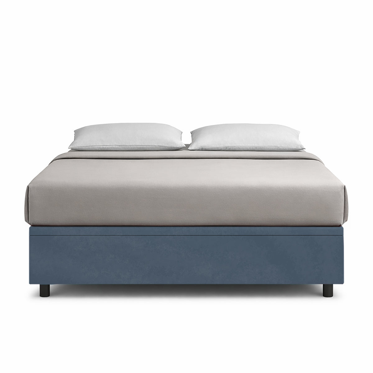 Letto BOXMAX blu visto di fronte con materasso e due guanciali bianchi su sfondo bianco #colore_Blu