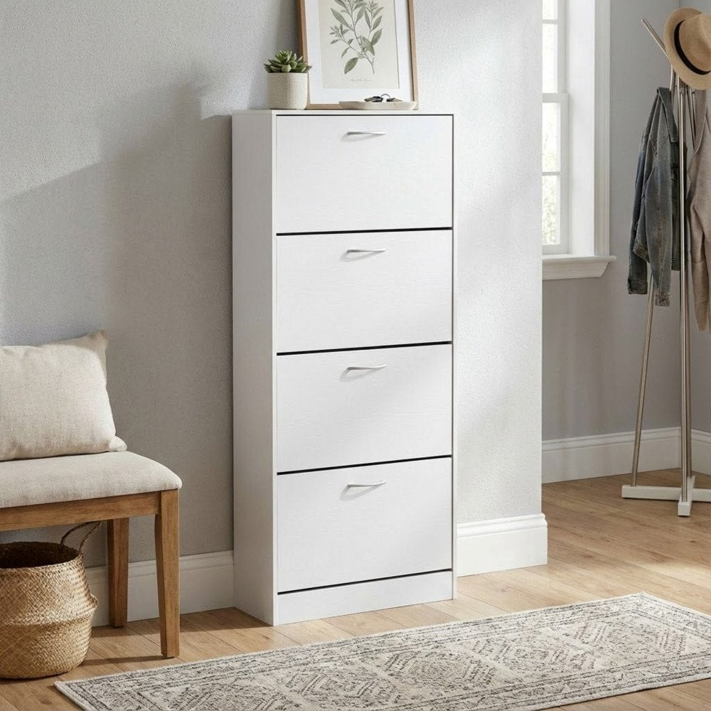 Mobile LOLA bianco a quattro cassetti in ambiente interno con panca e piante #colore_Bianco