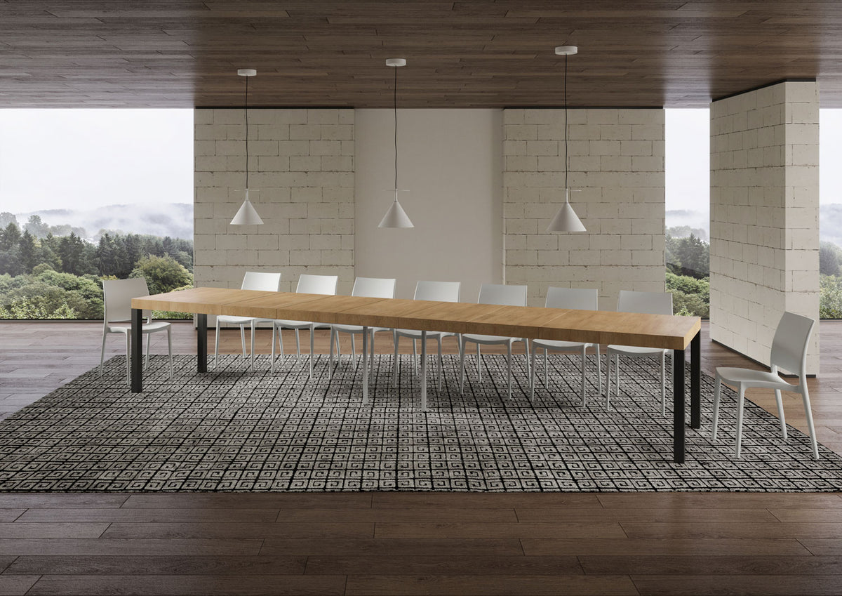 Tavolo EVERYDAY PREMIUM quercia natura allungato al massimo con dieci sedie in ambiente con pietra chiara #colore_Quercia Natura